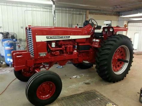 red tractor parked   garage