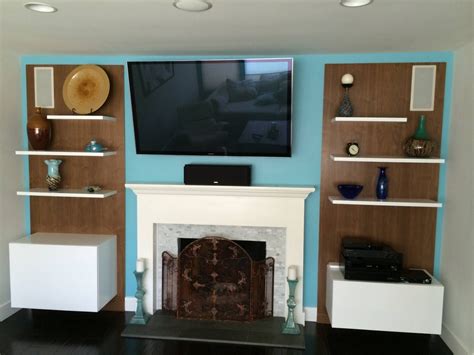 floating shelves create clean modern lines   stylish entertainment center fabricated