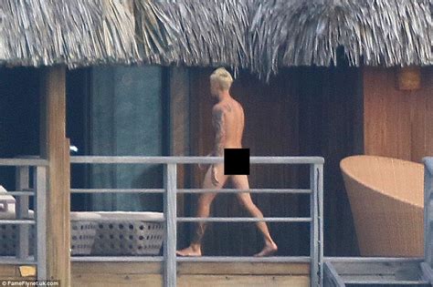 justin bieber goes full frontal naked as he enjoys a skinny dipping session in bora bora