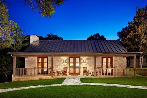 barndominium interiors exterior farmhouse  standing seam roof guest house stone  texas
