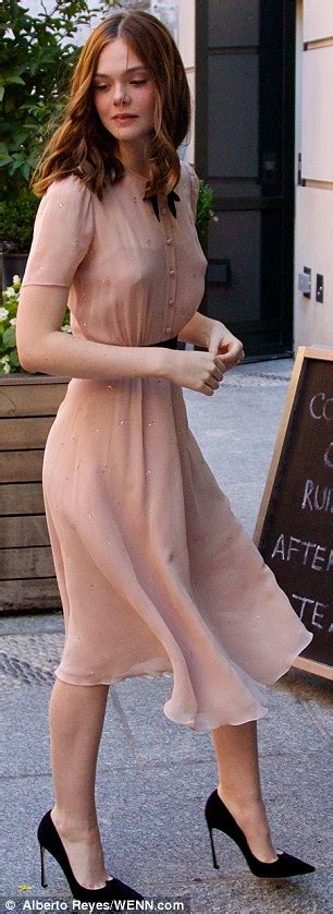 elle fanning in blush dress before black flowery frock for tv appearance daily mail online