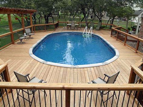 25 Top Oval Above Ground Swimming Pools Design With Decks Oval Pool