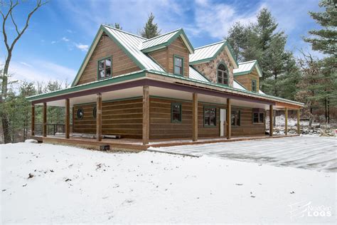 marchs nextgen logs home   month features walnut hand hewn siding  ranch style home
