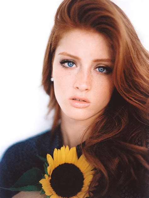 Blue Eyed Redhead And Sunflower Redheads