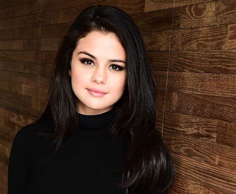 january 29 selena posing for portraits for “the fundamentals of caring