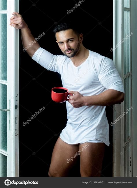 Morning Coffee Attractive Man In Underwear With Cup Of Coffee In Hand