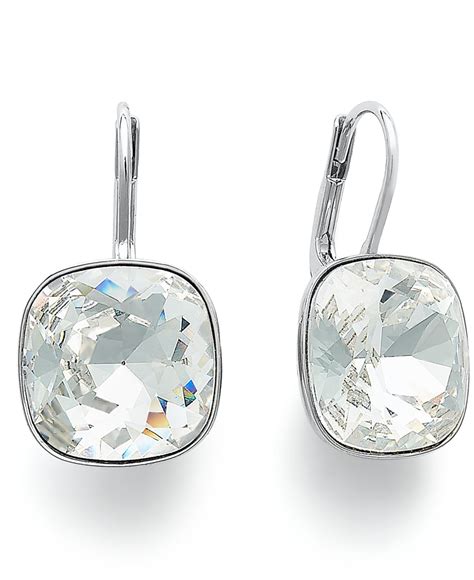 lyst swarovski silver tone crystal drop earrings  metallic