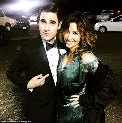 gina gershon shares photo with darren criss as she reveals she ll play his mother on glee