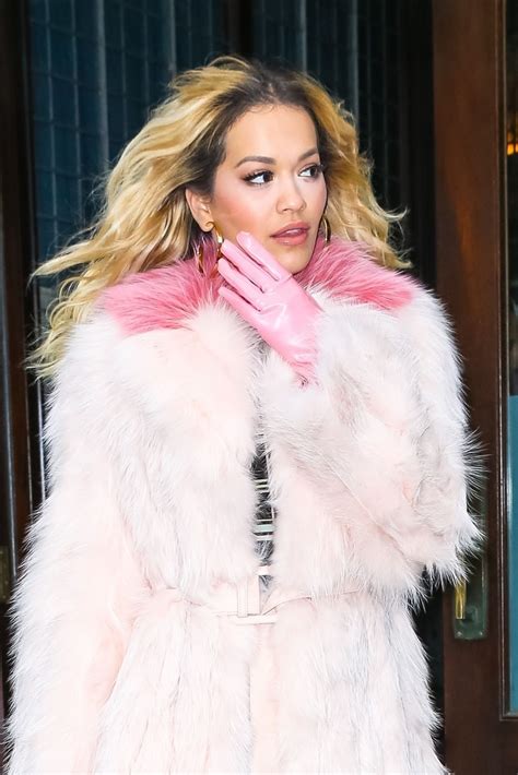 rita ora in a pink fur coat with pink gloves heads to the