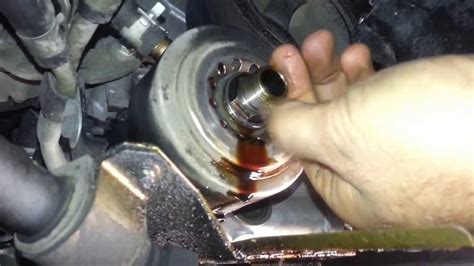 Nissan Xterra oil filter cooler housing oring leak - YouTube