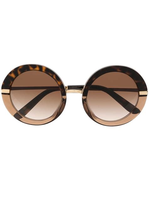 dolce gabbana eyewear solbriller med rundt stel og skildpaddeeffekt