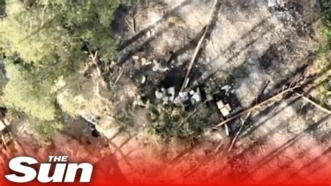 russian troops scramble  ukrainian drone drops bomb  trench nexth city