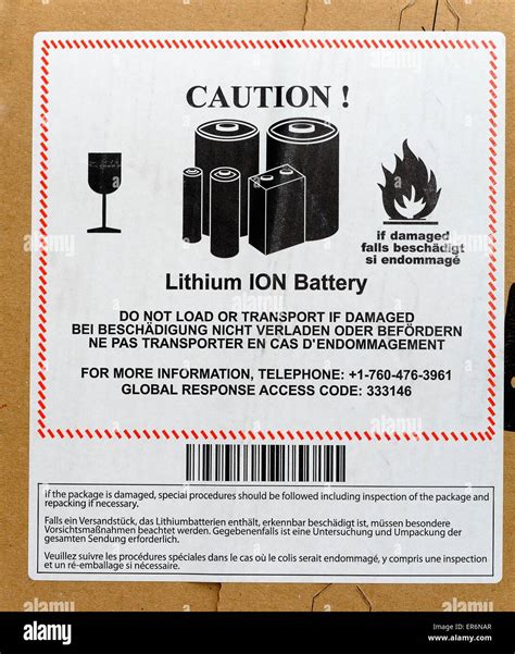 caution parcel label  lithium ion battery stock photo alamy