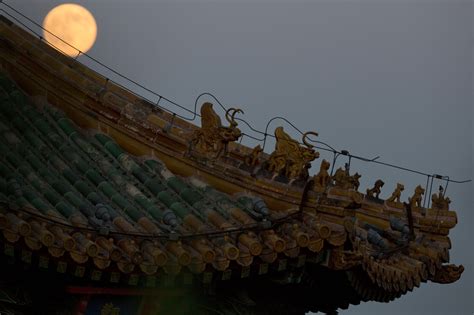 china plans to launch world s first artificial moon over city to light up night sky cbs news