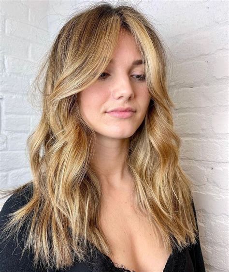 30 coolest curtain bangs for spring 2023 layered hair with bangs