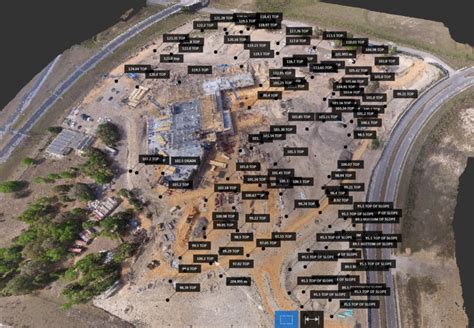 aerial view   construction site  lots  buildings  roads   background