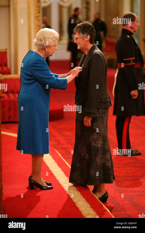 catherine hopkins  mbe queen buckingham palace  res stock