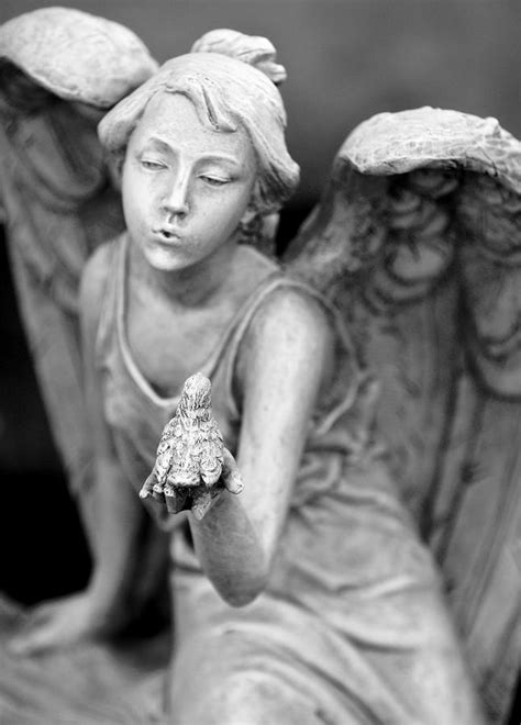 angel blowing kisses photograph  gwen allen