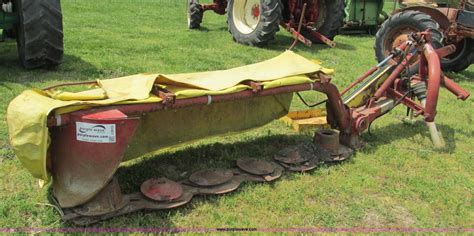 holland  disc mower  verona mo item  sold purple wave