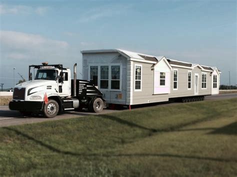 mobile home movers   features transporting  mobile home