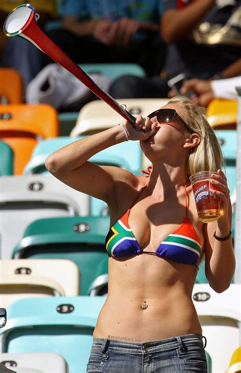 South African Flag On Bikini Top And She Is Blowing A