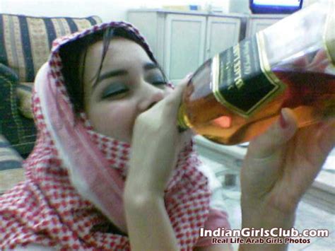 arab girl drinking bottle of black label indian girls club