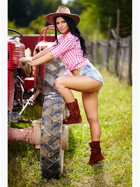 Sexy Farmer Girl In Hat Near The Tractor Photographic