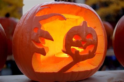 halloween witch holding pumpkin mgt design