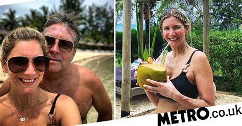 lisa faulkner and john torode rush to the beach after days of storms