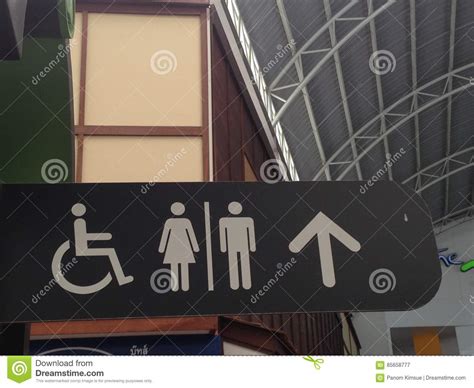 public restroom signs with a disabled access symbol stock
