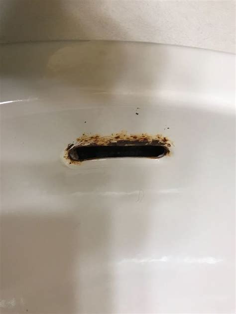 rust   overflow hole   bathroom sink    fix