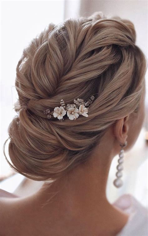 chic updo hairstyles for modern classic looks vanilla blonde textured