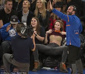 Whitney Cummings Flashes Crowd At Knicks Game As She Pulls Up Sweater
