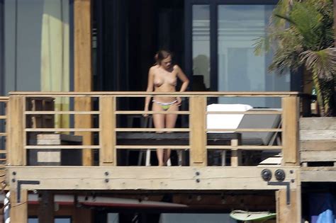cara delevingne topless on a balcony in malibu scandal planet