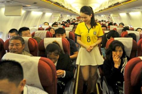 chinese flight attendants dress   skimpy brazil world cup uniforms