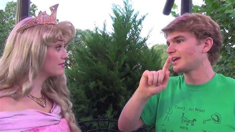 aurora kisses tommy then helps him wake adel at epcot youtube