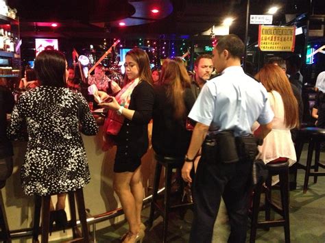 police raid hong kong sex clubs after murders at home of