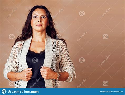 Pretty Brunette Confident Mature Woman Posing Cheerful On Warm