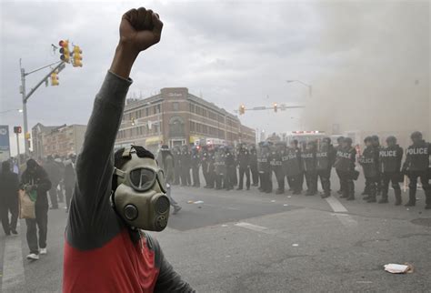 video angry mom beats son suspected of rioting in baltimore
