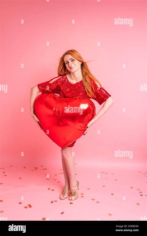 Beautiful Redhead Girl With Red Heart Balloon Posing Happy Valentines