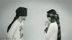 love at first kiss four pairs of strangers lock lips while blindfolded to see if it is possible