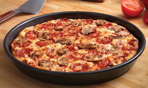 dominos launches deep pan pizza  double  number  calories   regular thin crust