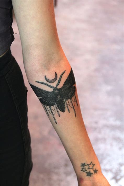 Amazing Black Girly Moth Tattoo On Arm Tattooimages