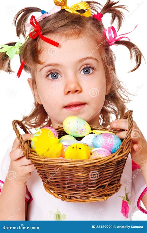 girl holding easter eggs stock photo image
