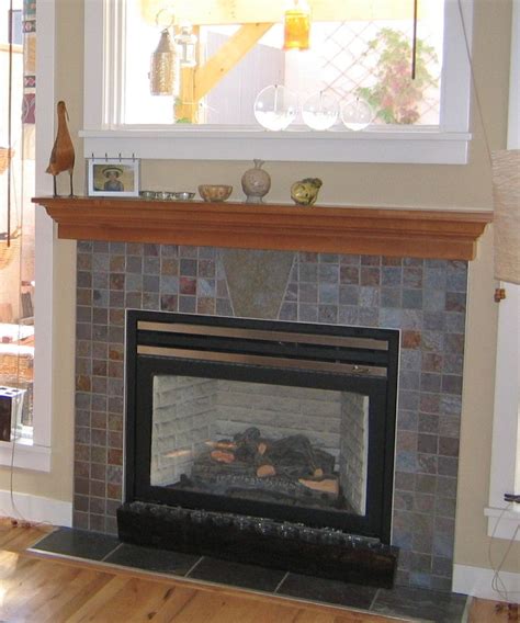 fireplace  tile surround   light oak wood fireplace cabinet  stone tile