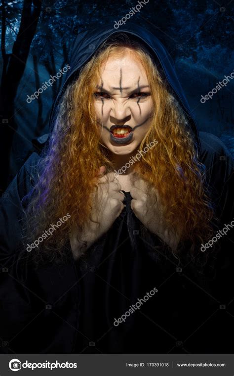 scary witch  night forest stock photo  rbvrbv