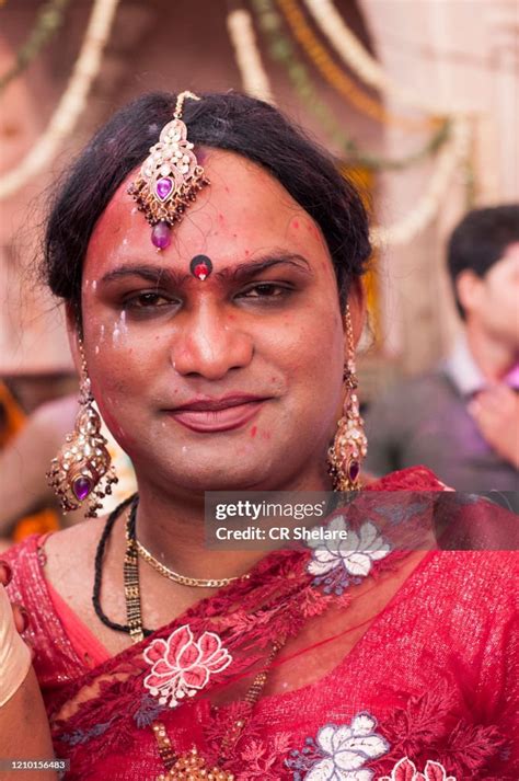 transgender or hijra smear themselves with colors during the lathmar