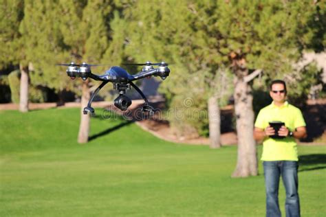 man flying  camera drone large file stock image image  high