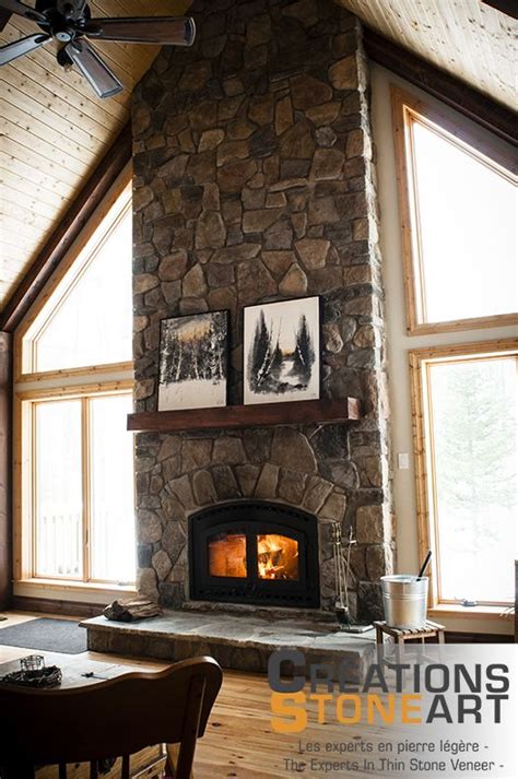 fireplace done with tudor old country fieldstone from