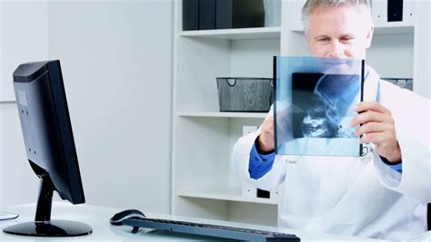 Caucasian Male Hospital Doctor Checking Stock Footage